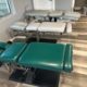 Various used chiropractic tables